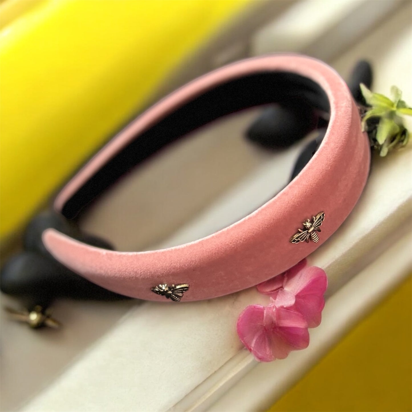 Golden Buzz: Bee-Band Headband with Striking Pink and Gold Accents