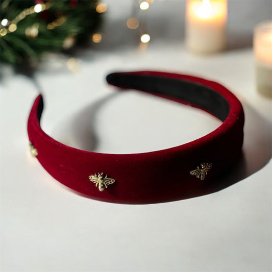 Golden Buzz: Bee-Band Headband with Striking Red and Gold Accents